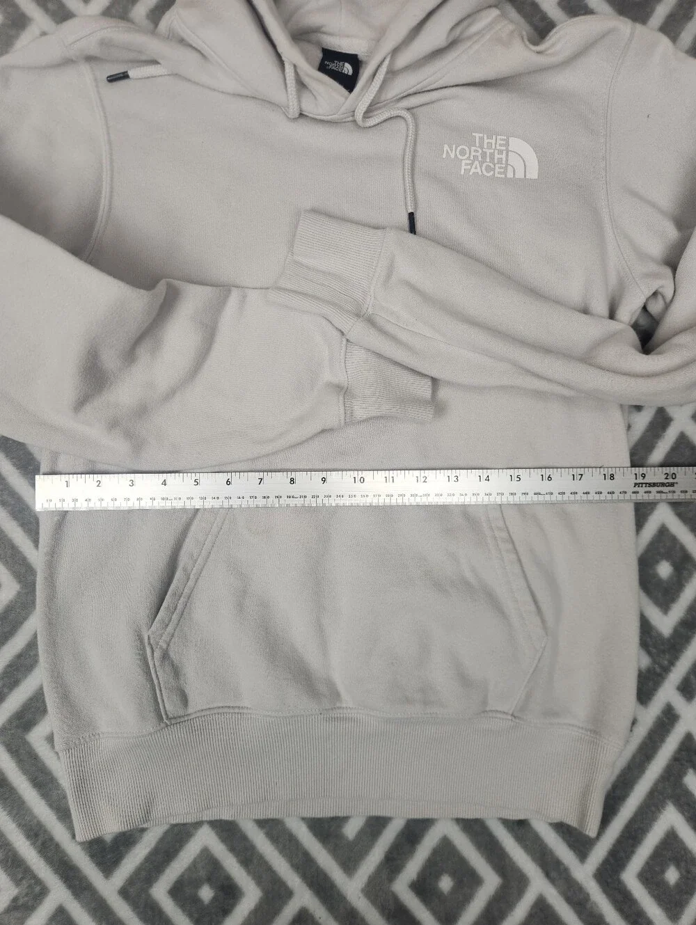 The North Face Never Stop Exploring Cream Hoodie with Blue & Purple Graphic